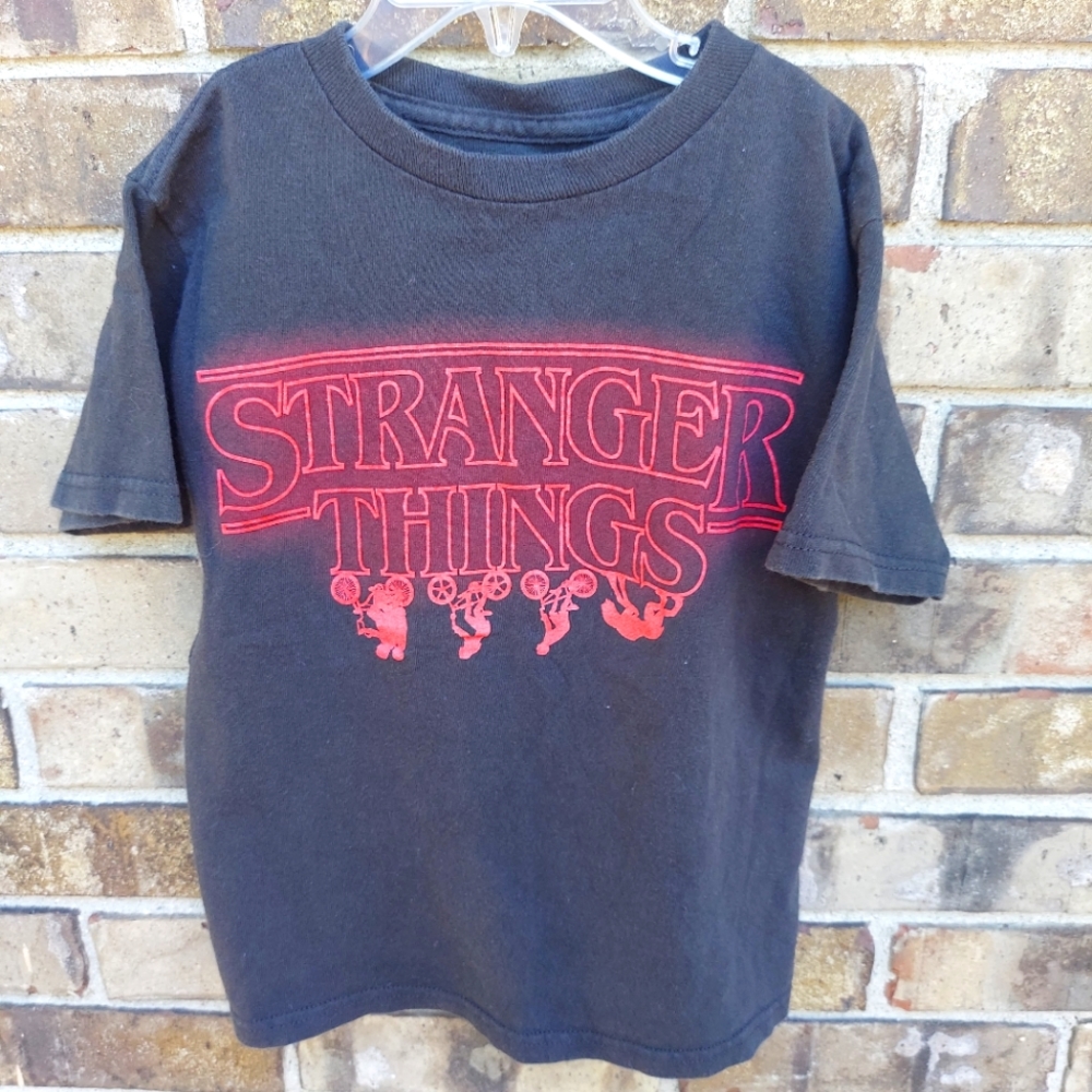 Youth Stranger Things Tshirt Unisex Size 5 Black w/ red writing. Pre-owned